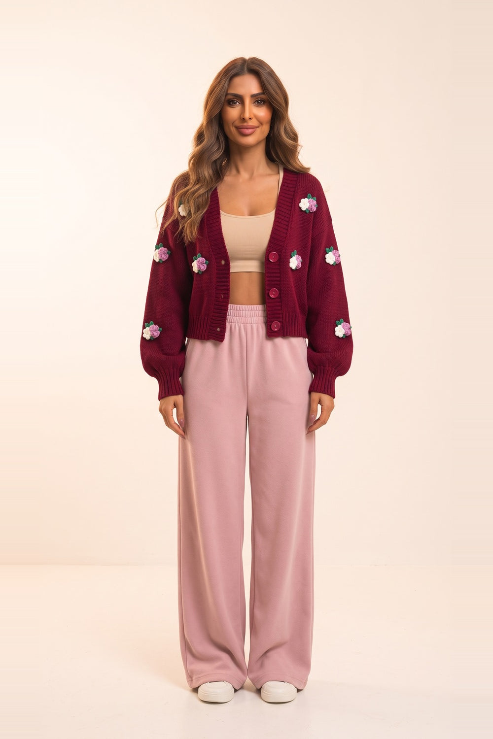 Women's burgundy cropped cardigan and pink wide leg pants set – 3D flower appliqué knit cardigan, on model | Topline Lebanon