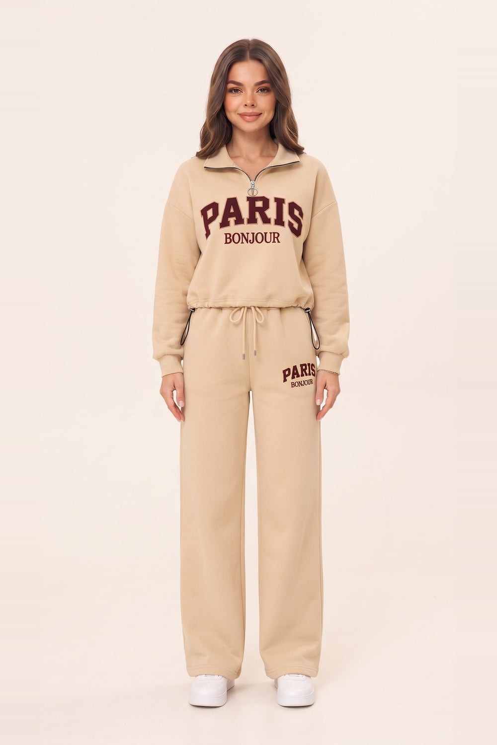 Women's beige half zip sweatshirt and wide leg sweatpants set – PARIS letter print, drawstring waist, on model | Topline Lebanon