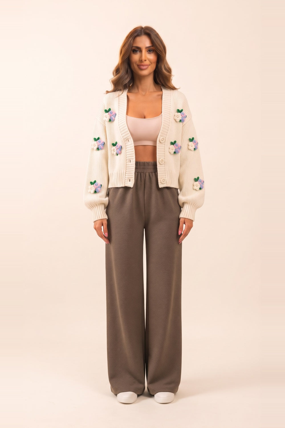 Women's cream cropped cardigan and mocha wide leg pants set – 3D flower appliqué knit cardigan, on model | Topline Lebanon