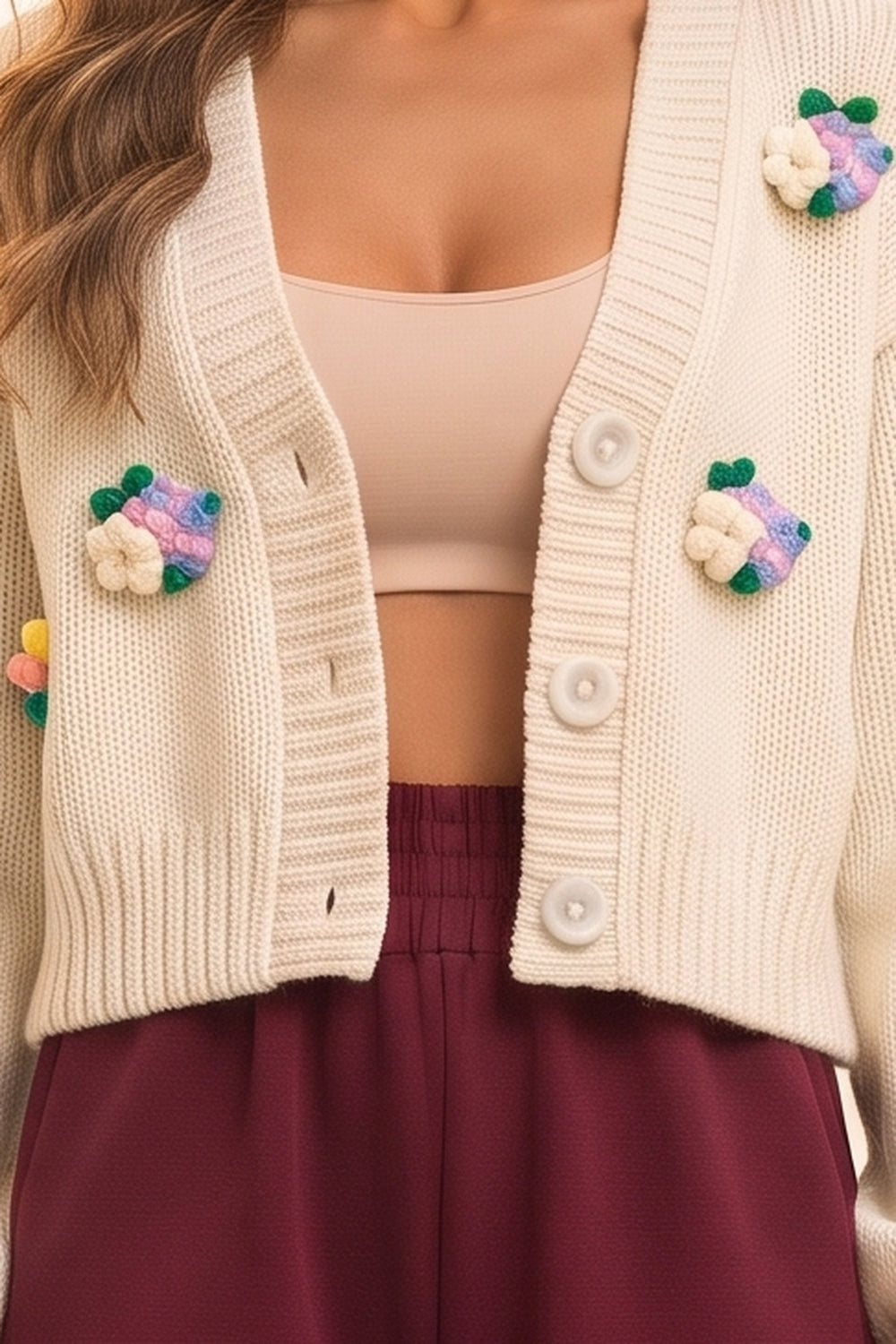 Women's cream cropped cardigan and burgundy wide leg pants set – 3D flower appliqué knit cardigan, close-up of the details | Topline Lebanon