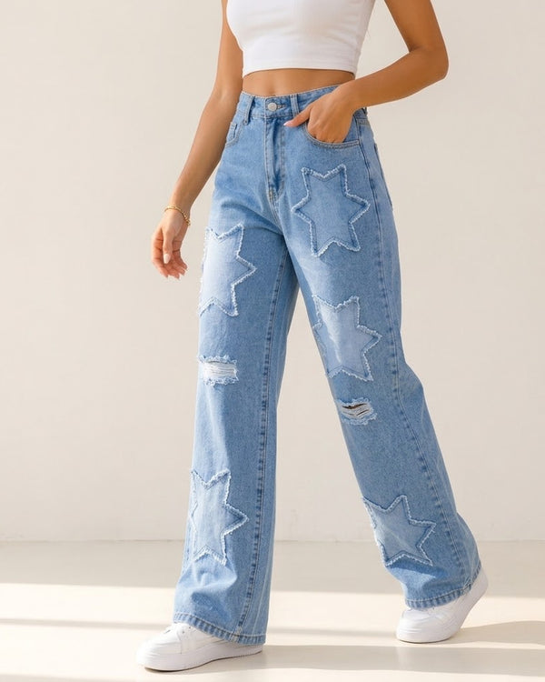 Women's light blue star patch wide-leg jeans on model