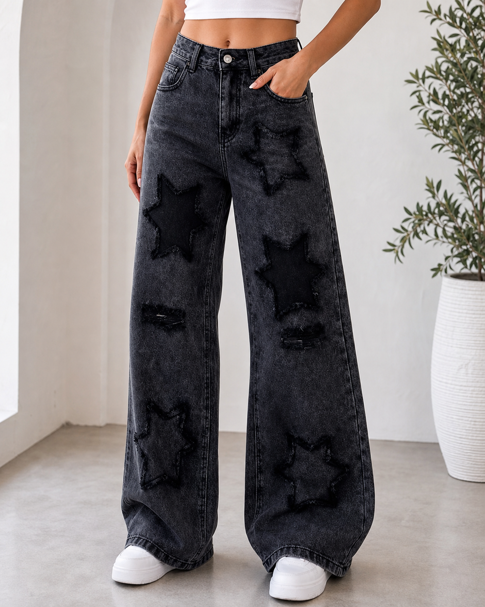 Washed black star patch wide leg jeans