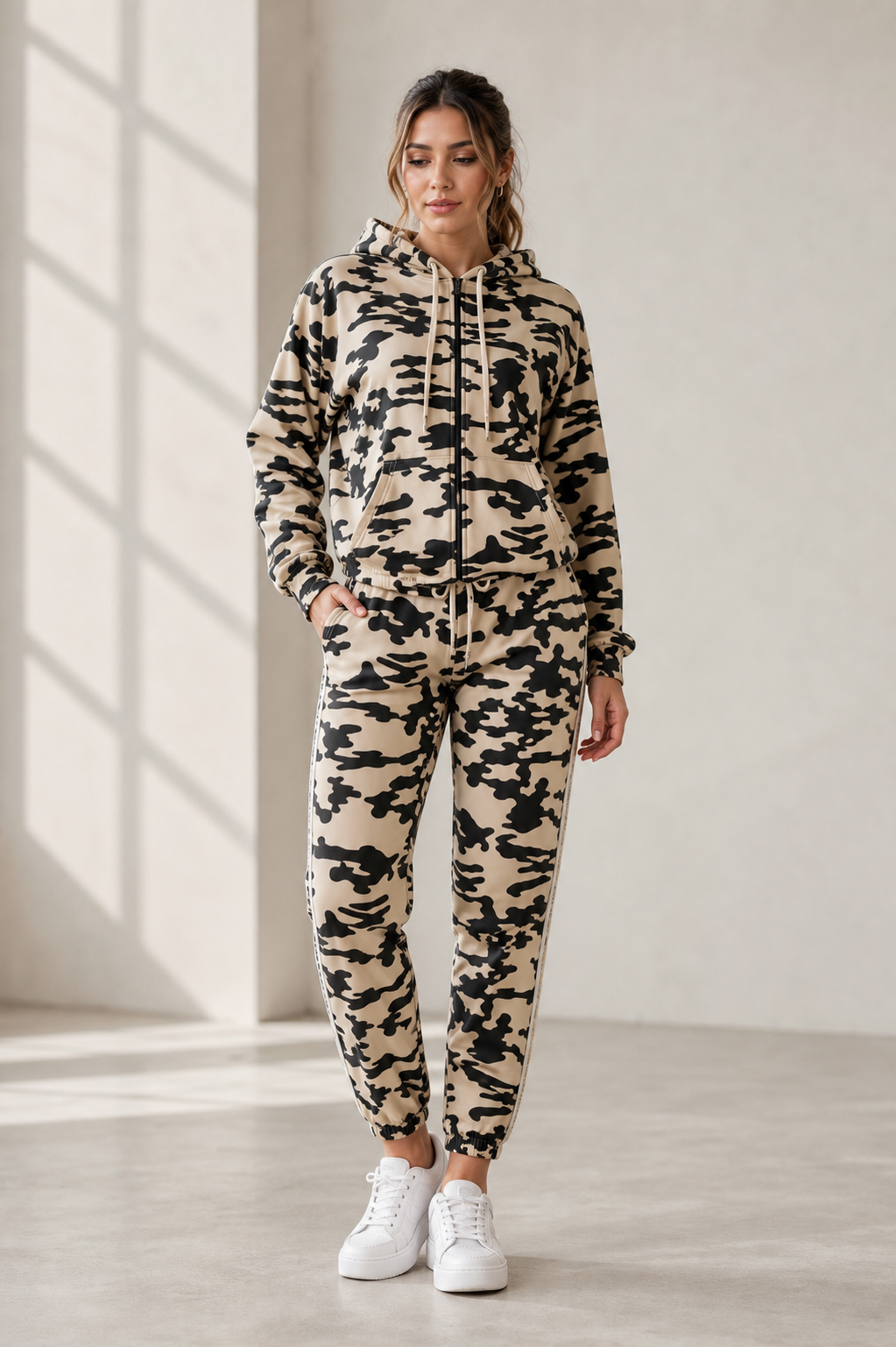 Beige camo hoodie and jogger set on model