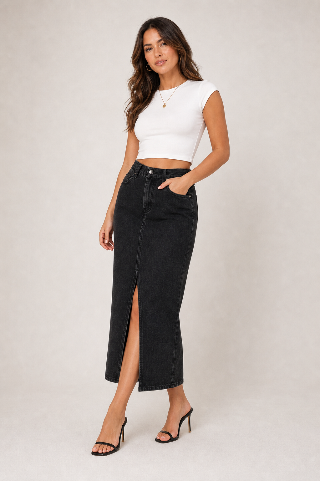 Black denim midi skirt on model